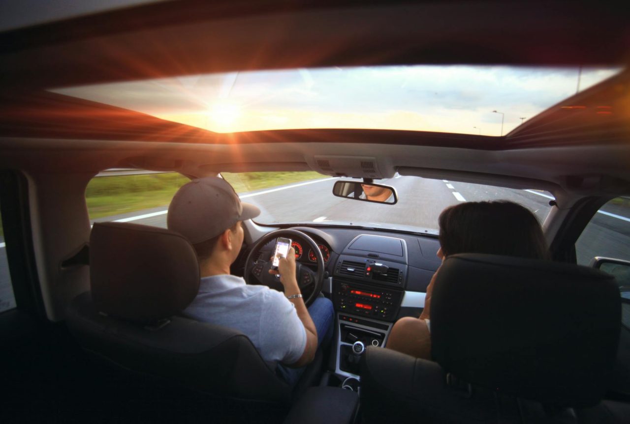 Vehicle connected to diagnostic tool for signed firmware update.